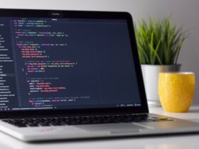 Laptop displaying code for software development