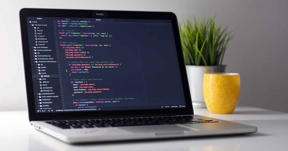 Laptop displaying code for software development