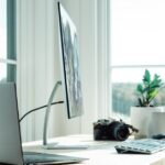 Gaming laptop setup with headset for budget gaming under 1000 dollars