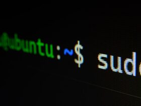 Laptop screen displaying code in a dark programming environment