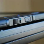 Slider and button controls on the edge of a Dell Latitude XT
