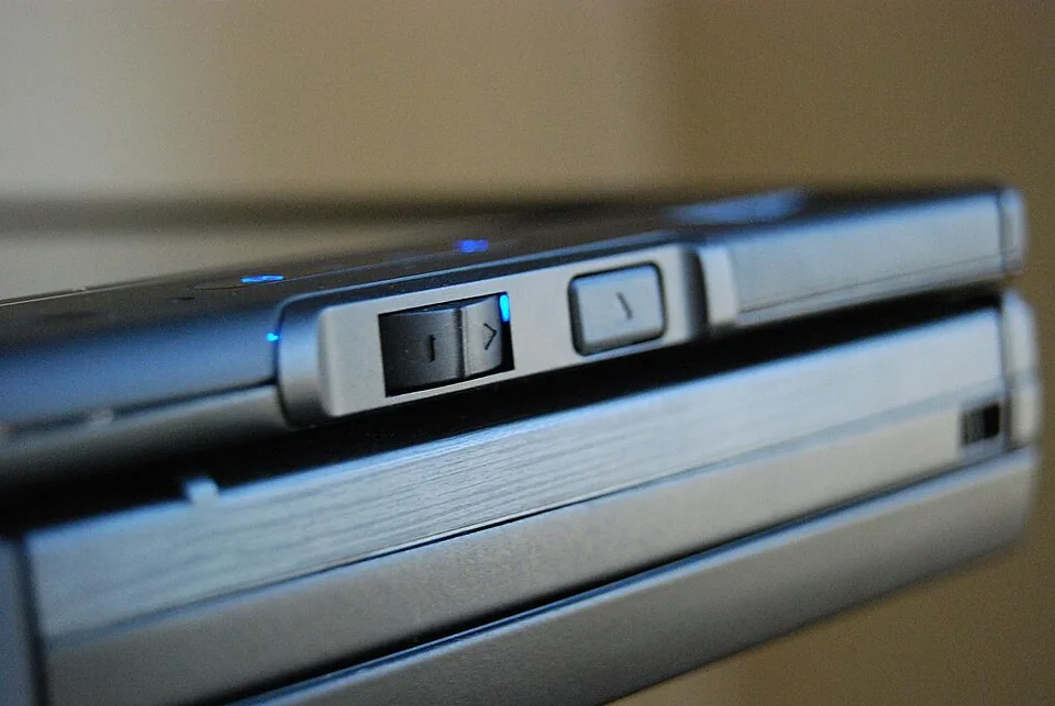 Slider and button controls on the edge of a Dell Latitude XT